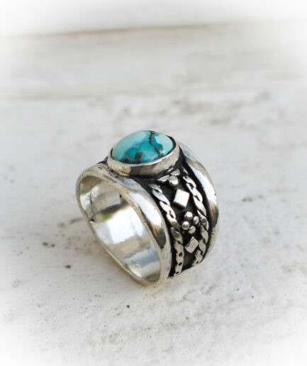 Grote herenring in zilver met turquoise steen